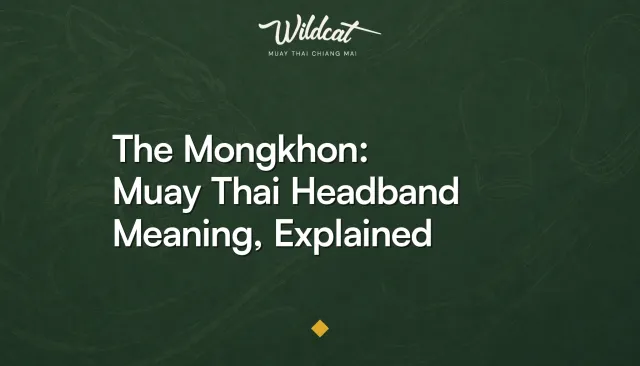 A mongkhon headband resting on the ropes of Wildcat's open-air Muay Thai ring in Chiang Mai